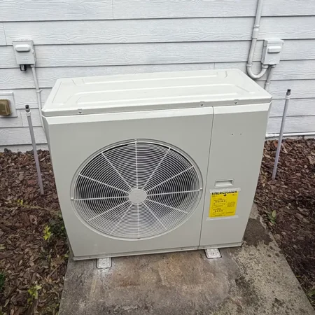 New outdoor AC unit in Jacksonville, Florida. Caption reads "AFTER."