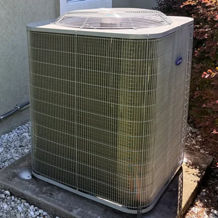 New outdoor AC unit in Jacksonville, Florida. Caption reads "AFTER."