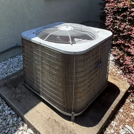 Rusty outdoor AC unit in Jacksonville, Florida. Caption reads "BEFORE."