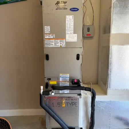 New air handler in Jacksonville, Florida home. Caption reads "AFTER."