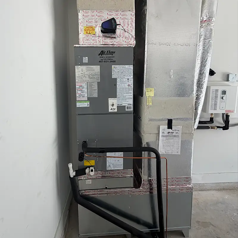 Indoor air handler and ductwork installed during an AC replacement in Middleburg.