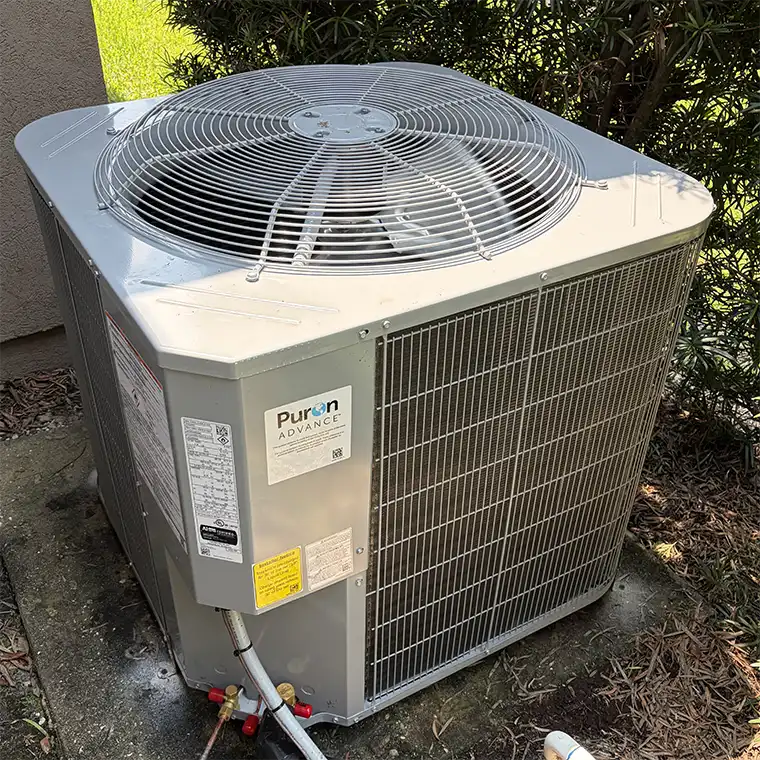 Carrier Puron Advance outdoor AC condenser installed at a home in St. Augustine.