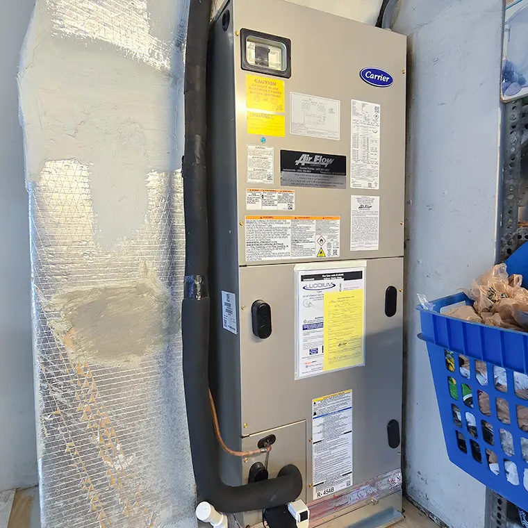 Carrier indoor air handler installed during an AC replacement in Orlando.
